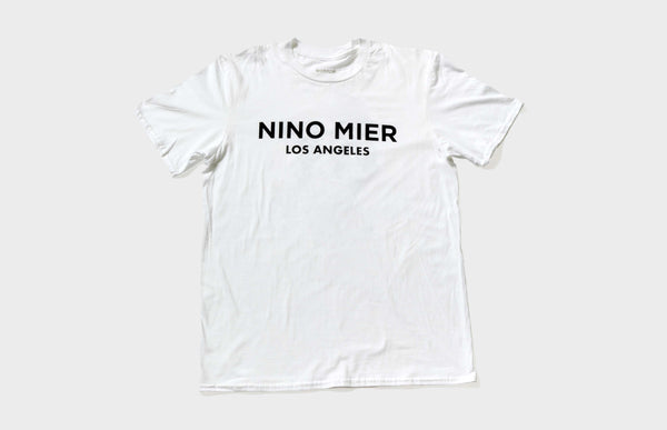 NINO MIER LOCATION LOGO T-SHIRT: LOS ANGELES, BRUSSELS, MARFA